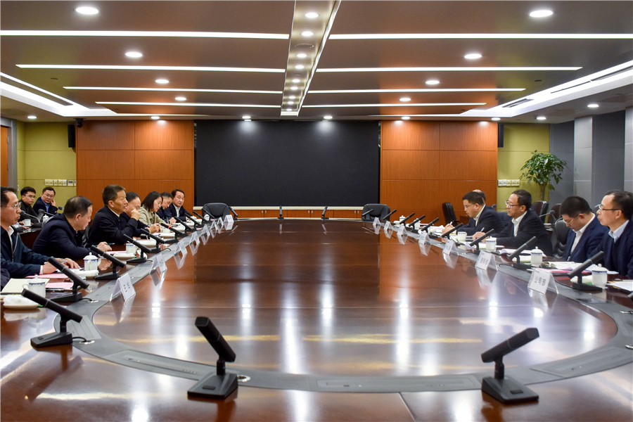 許忠建赴上海市拜訪(fǎng)交通銀行